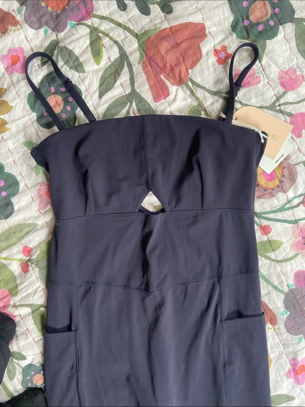 Logilates NWT Black Peekaboo Onsie Flare Leg Jumpsuit M